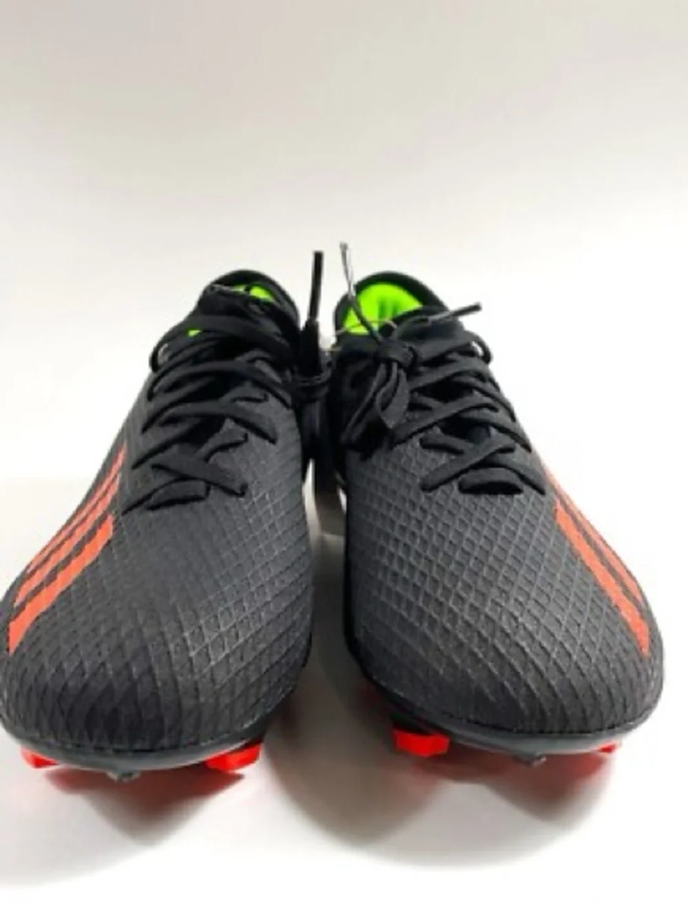 adidas Men's Black Soccer Cleats with Orange Stripes and Green Lining
